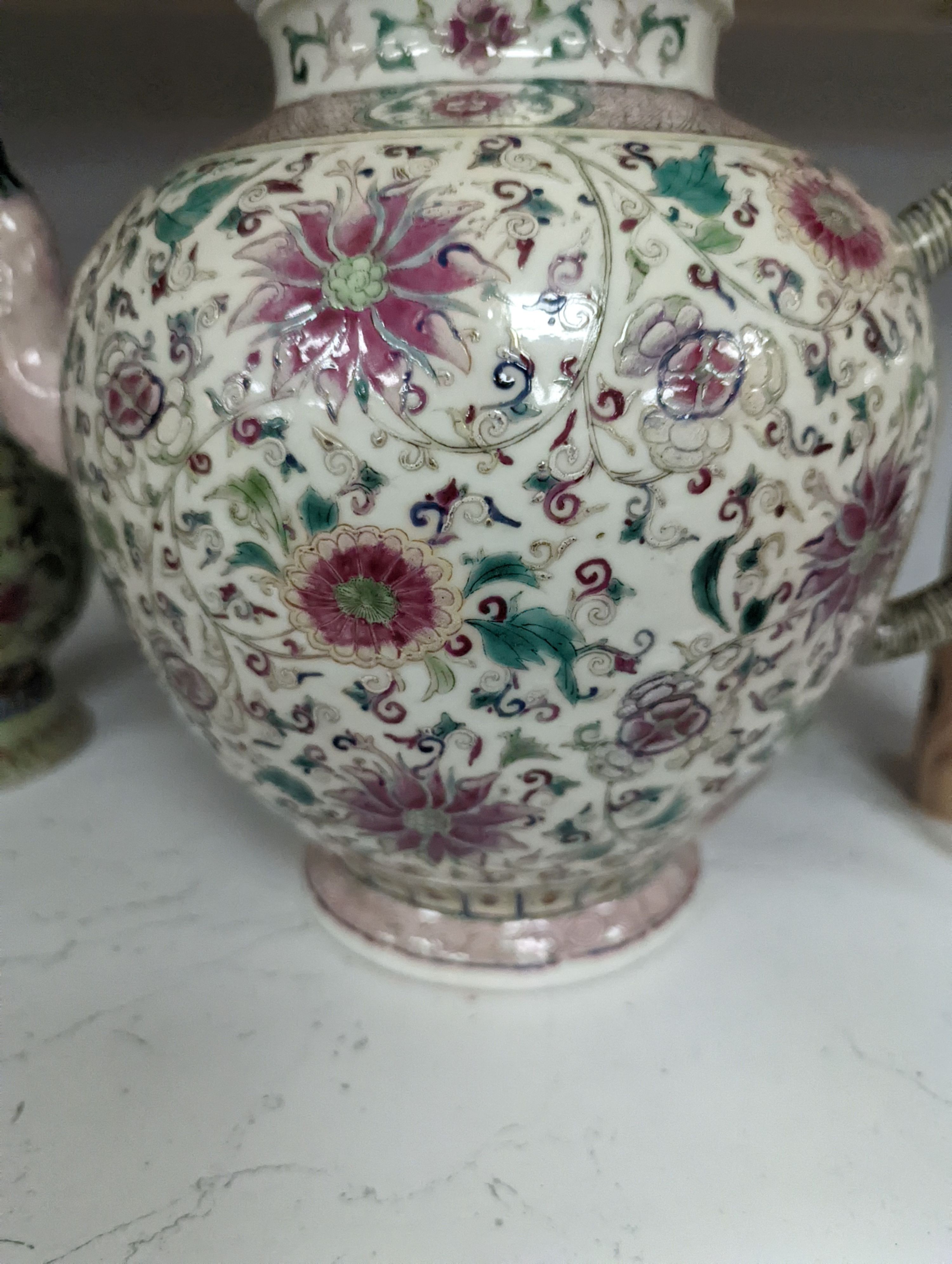 A large 19th century Chinese famille rose wine pot, and another wine pot, tallest 27cm